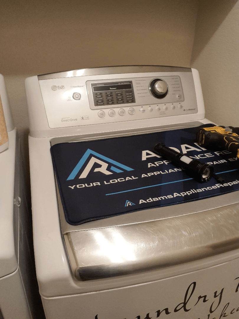 LG top-load washing machine fixed by Adams Appliance Repair