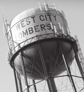 Black and white picture of landmark Midwest City water tower.